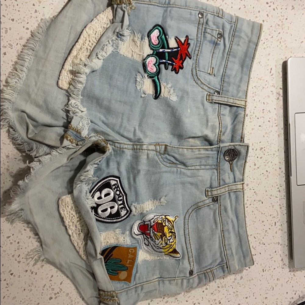 Faded blue shirt with beautiful tags